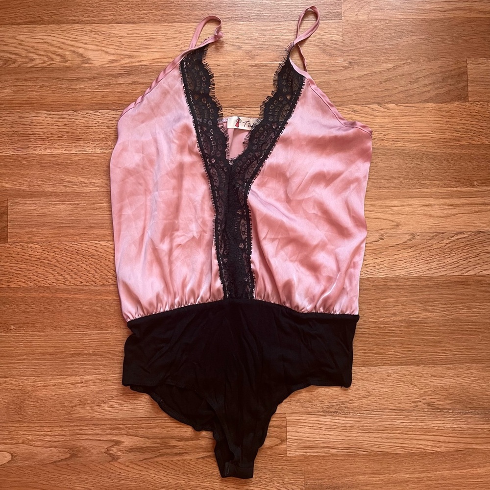 Pink and black bodysuit